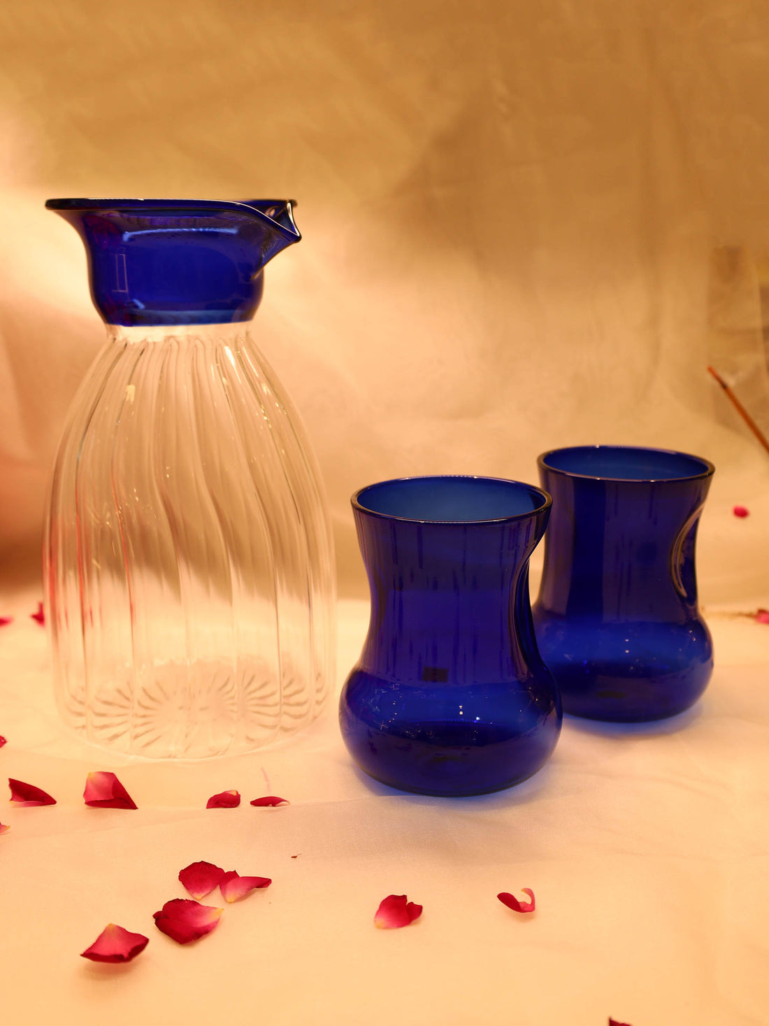 Blue Penguin fluted Pitcher with Dimpled blue glasses (set of 2)
